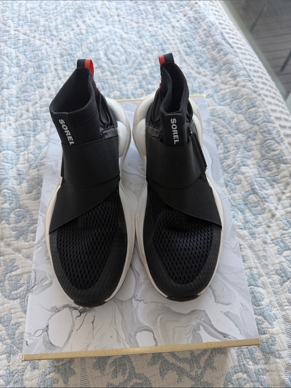 Sorel Black and White Slip-On Athletic Sneakers with Red Heel Tab
